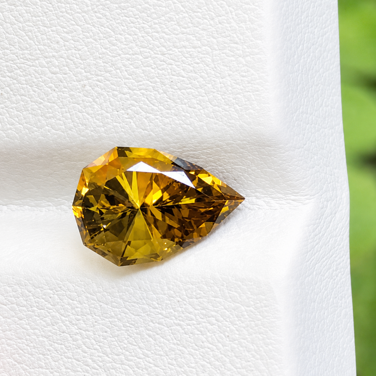 Pear-cut yellow zoisite presented in the Joyzanite catalogue
