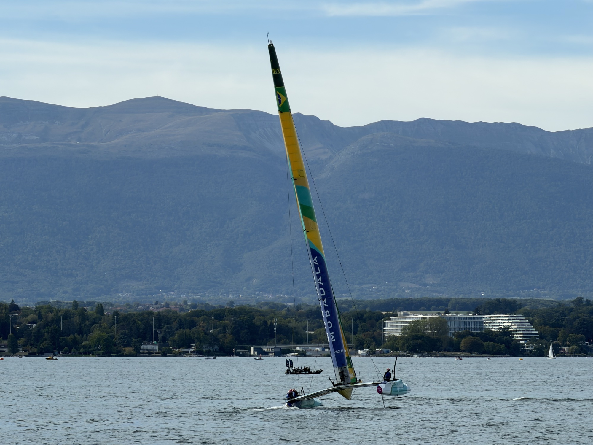 The Brazilian catamaran on Lake Geneva against the city landscape