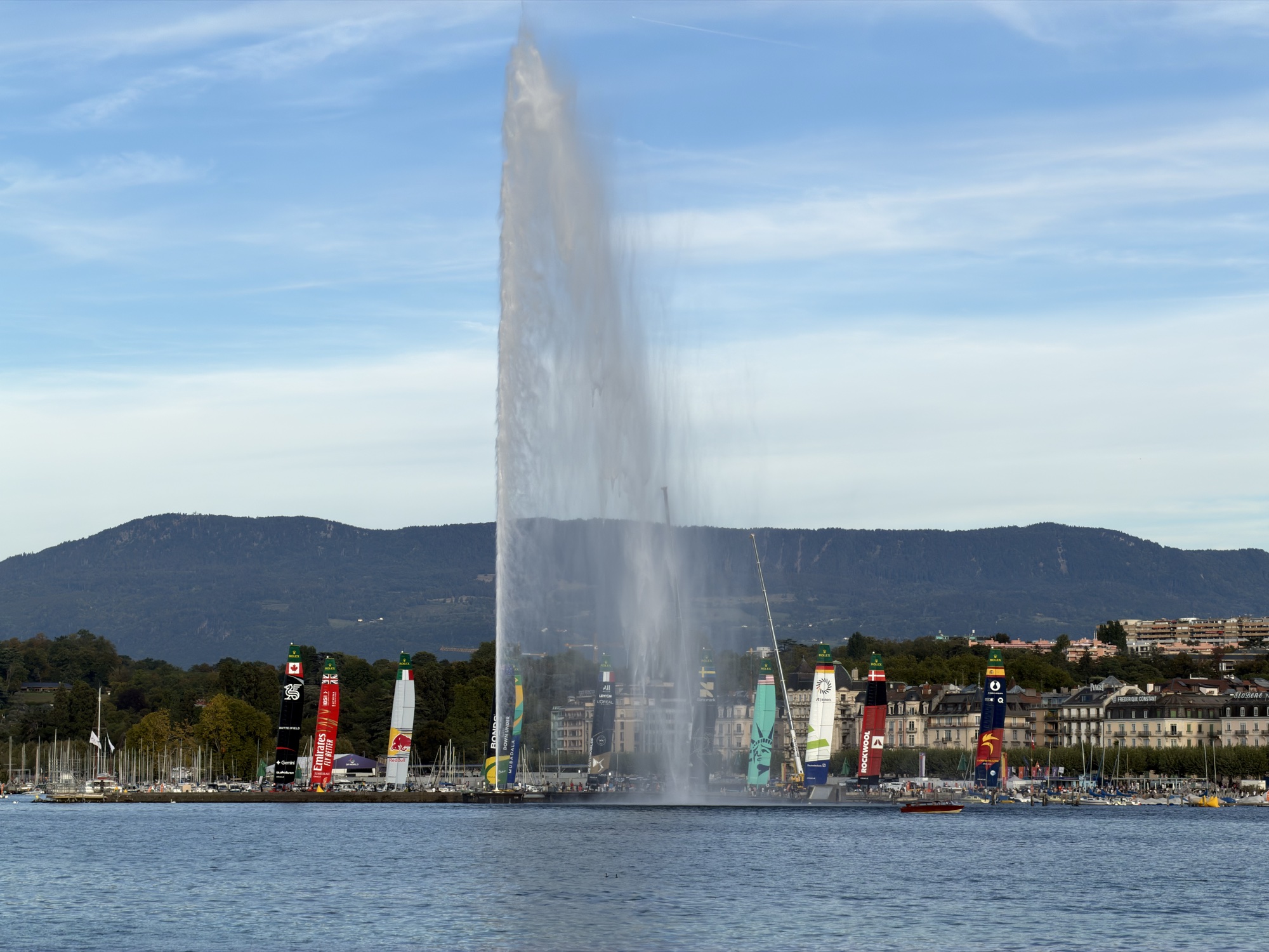 Geneva’s Jet d’Eau in front of the SailGP team wings